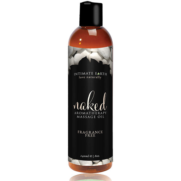 Naked Unscented aromatherapie massageolie 240 ml, doorzichtige fles met goudkleurige olie en zwart etiket