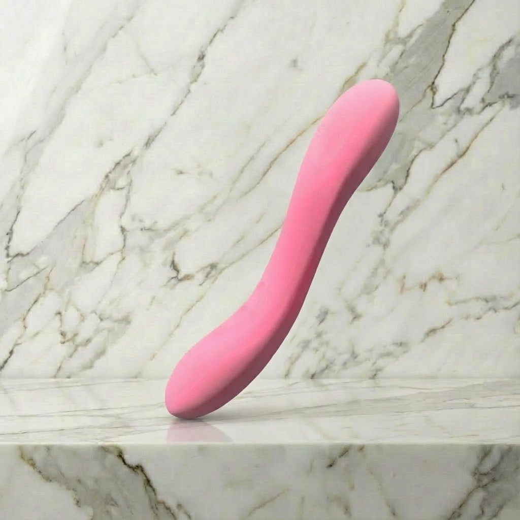 Detail van de bedieningsknoppen en textuur van het paarse Sisley product