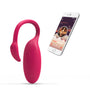Roze Magic Motion Flamingo vibrerend ei naast smartphone met bedieningsapp