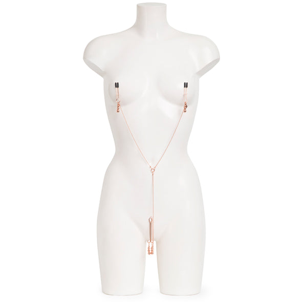 Close-up detail van verstelbare klemmen aan nipple chain, toont fijne afwerking en materiaalstructuur