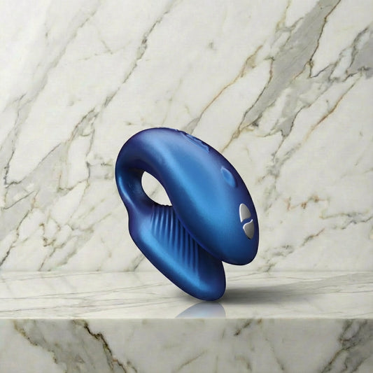 We-Vibe Chorus koppelvibrator in blauw, vooraanzicht op witte achtergrond