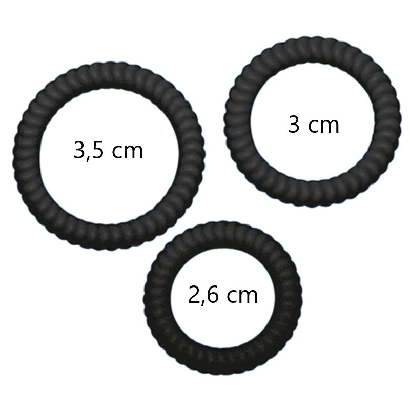 Drie zwarte geribde cockringen met maataanduidingen 2,6 tot 3,5 cm