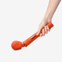 VIM oranje wand massager met Fun Factory verpakking en accessoires